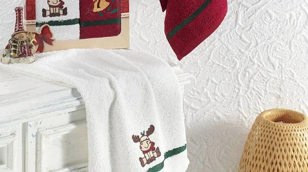 Välja festliga handdukar: vad man ska tänka på när man köper dem